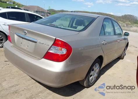 2003 Toyota Camry Le z USA, uszkodzony, nr VIN 4T1BE32K03U760397